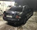 Міцубісі Lancer 2006 у Синельниковом на Automoto.ua Сірий Міцубісі Lancer, об'ємом двигуна 2 л та пробігом 200 тис. км за 3000 $, фото 7 на Automoto.ua