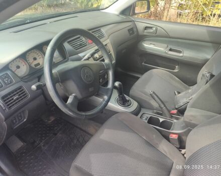 Сірий Міцубісі Lancer, об'ємом двигуна 1.6 л та пробігом 240 тис. км за 4400 $, фото 5 на Automoto.ua