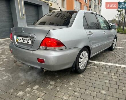 Серый Мицубиси Лансер, объемом двигателя 1.6 л и пробегом 333 тыс. км за 2800 $, фото 10 на Automoto.ua