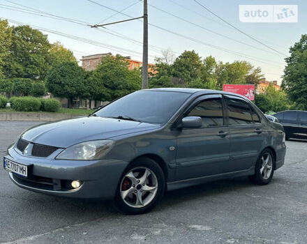 Сірий Міцубісі Lancer, об'ємом двигуна 2 л та пробігом 216 тис. км за 6500 $, фото 3 на Automoto.ua