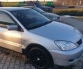 Серый Мицубиси Лансер, объемом двигателя 1.58 л и пробегом 301 тыс. км за 3500 $, фото 5 на Automoto.ua