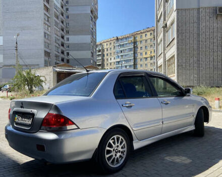 Сірий Міцубісі Lancer, об'ємом двигуна 1.6 л та пробігом 200 тис. км за 4400 $, фото 4 на Automoto.ua