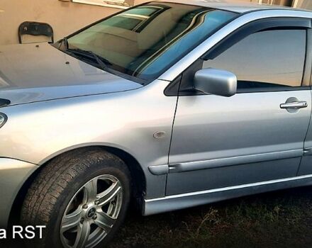 Сірий Міцубісі Lancer, об'ємом двигуна 1.6 л та пробігом 237 тис. км за 5000 $, фото 3 на Automoto.ua