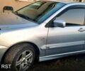 Сірий Міцубісі Lancer, об'ємом двигуна 1.6 л та пробігом 237 тис. км за 5000 $, фото 3 на Automoto.ua