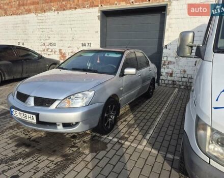 Серый Мицубиси Лансер, объемом двигателя 1.58 л и пробегом 301 тыс. км за 3500 $, фото 1 на Automoto.ua