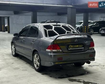 Серый Мицубиси Лансер, объемом двигателя 1.58 л и пробегом 300 тыс. км за 4600 $, фото 3 на Automoto.ua