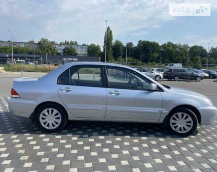 Сірий Міцубісі Lancer, об'ємом двигуна 1.6 л та пробігом 236 тис. км за 4999 $, фото 6 на Automoto.ua