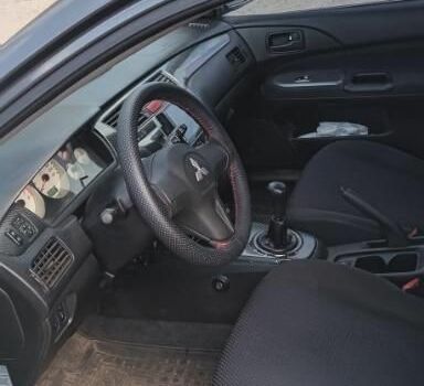 Серый Мицубиси Лансер, объемом двигателя 0 л и пробегом 273 тыс. км за 4600 $, фото 5 на Automoto.ua