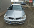 Сірий Міцубісі Lancer, об'ємом двигуна 1.6 л та пробігом 167 тис. км за 6500 $, фото 1 на Automoto.ua
