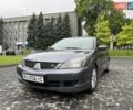 Серый Мицубиси Лансер, объемом двигателя 2 л и пробегом 200 тыс. км за 4300 $, фото 1 на Automoto.ua