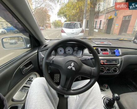 Серый Мицубиси Лансер, объемом двигателя 1.6 л и пробегом 444 тыс. км за 3400 $, фото 11 на Automoto.ua