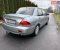 Сірий Міцубісі Lancer, об'ємом двигуна 1.58 л та пробігом 333 тис. км за 2999 $, фото 7 на Automoto.ua