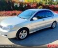 Сірий Міцубісі Lancer, об'ємом двигуна 1.6 л та пробігом 226 тис. км за 4000 $, фото 1 на Automoto.ua