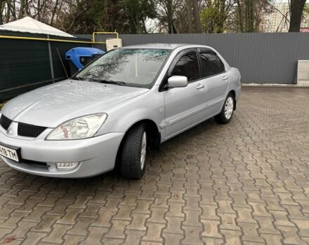 Серый Мицубиси Лансер, объемом двигателя 1.6 л и пробегом 260 тыс. км за 4999 $, фото 3 на Automoto.ua