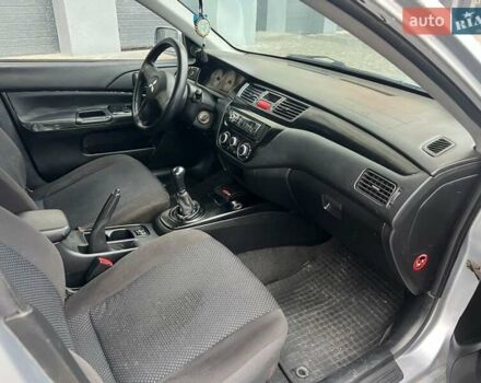 Серый Мицубиси Лансер, объемом двигателя 1.6 л и пробегом 333 тыс. км за 2800 $, фото 12 на Automoto.ua