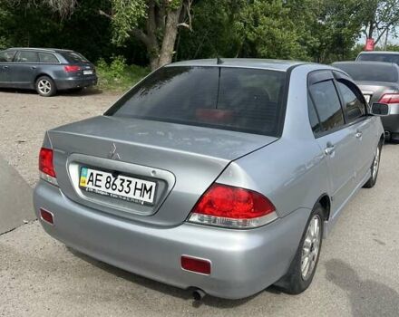 Сірий Міцубісі Lancer, об'ємом двигуна 1.58 л та пробігом 197 тис. км за 3450 $, фото 10 на Automoto.ua
