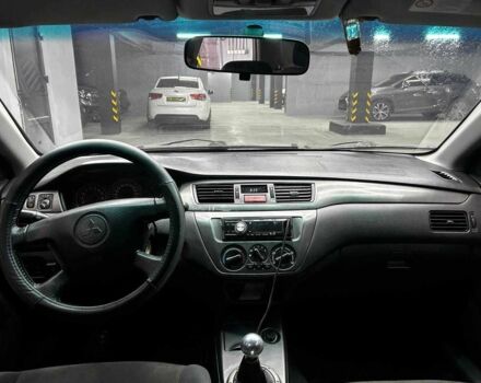 Серый Мицубиси Лансер, объемом двигателя 1.6 л и пробегом 300 тыс. км за 4600 $, фото 7 на Automoto.ua