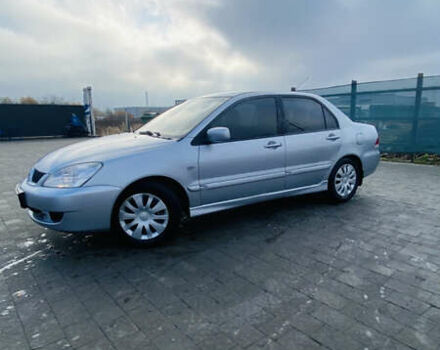 Серый Мицубиси Лансер, объемом двигателя 1.6 л и пробегом 253 тыс. км за 2850 $, фото 10 на Automoto.ua