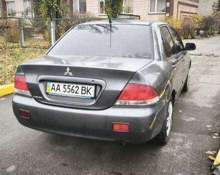 Серый Мицубиси Лансер, объемом двигателя 1.6 л и пробегом 263 тыс. км за 3800 $, фото 4 на Automoto.ua