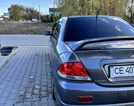 Мицубиси Лансер 2006 в Черновцах на Automoto.ua Серый Мицубиси Лансер, объемом двигателя 1.6 л и пробегом 263 тыс. км за 4500 $, фото 6 на Automoto.ua