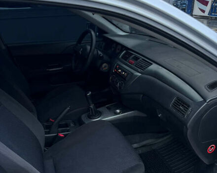 Серый Мицубиси Лансер, объемом двигателя 1.6 л и пробегом 269 тыс. км за 4000 $, фото 7 на Automoto.ua