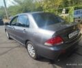 Сірий Міцубісі Lancer, об'ємом двигуна 1.6 л та пробігом 240 тис. км за 4400 $, фото 2 на Automoto.ua