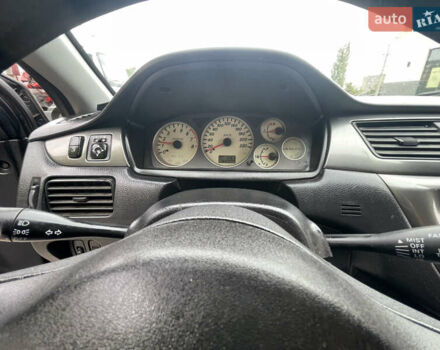 Сірий Міцубісі Lancer, об'ємом двигуна 1.58 л та пробігом 162 тис. км за 4650 $, фото 17 на Automoto.ua