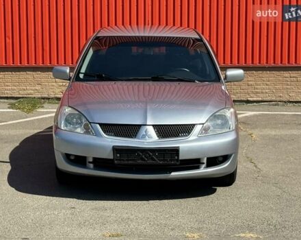 Серый Мицубиси Лансер, объемом двигателя 0 л и пробегом 182 тыс. км за 6500 $, фото 2 на Automoto.ua