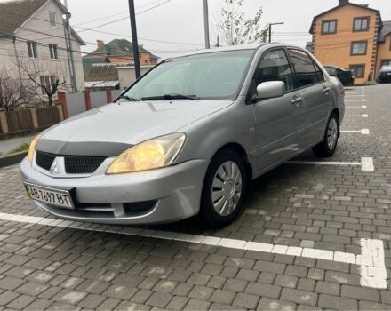 Серый Мицубиси Лансер, объемом двигателя 1.6 л и пробегом 333 тыс. км за 2800 $, фото 2 на Automoto.ua