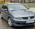 Серый Мицубиси Лансер, объемом двигателя 0 л и пробегом 245 тыс. км за 3500 $, фото 1 на Automoto.ua