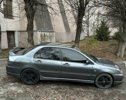 Сірий Міцубісі Lancer, об'ємом двигуна 2 л та пробігом 200 тис. км за 4999 $, фото 6 на Automoto.ua