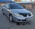 Сірий Міцубісі Lancer, об'ємом двигуна 1.58 л та пробігом 207 тис. км за 4300 $, фото 8 на Automoto.ua