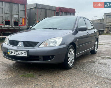 Серый Мицубиси Лансер, объемом двигателя 1.6 л и пробегом 193 тыс. км за 4700 $, фото 1 на Automoto.ua