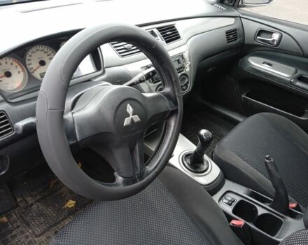 Сірий Міцубісі Lancer, об'ємом двигуна 1.6 л та пробігом 300 тис. км за 2999 $, фото 7 на Automoto.ua
