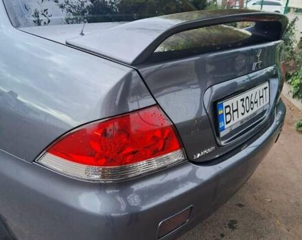Сірий Міцубісі Lancer, об'ємом двигуна 1.6 л та пробігом 229 тис. км за 4900 $, фото 25 на Automoto.ua