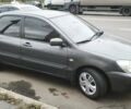 Серый Мицубиси Лансер, объемом двигателя 1.6 л и пробегом 263 тыс. км за 3650 $, фото 3 на Automoto.ua