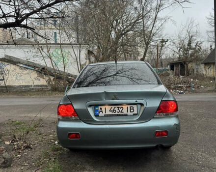 Сірий Міцубісі Lancer, об'ємом двигуна 1.6 л та пробігом 240 тис. км за 3000 $, фото 5 на Automoto.ua