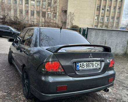 Сірий Міцубісі Lancer, об'ємом двигуна 2 л та пробігом 200 тис. км за 4999 $, фото 9 на Automoto.ua
