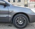 Сірий Міцубісі Lancer, об'ємом двигуна 1.6 л та пробігом 218 тис. км за 5700 $, фото 17 на Automoto.ua