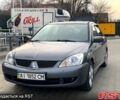 Серый Мицубиси Лансер, объемом двигателя 1.6 л и пробегом 170 тыс. км за 3850 $, фото 1 на Automoto.ua