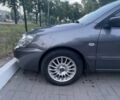 Сірий Міцубісі Lancer, об'ємом двигуна 1.6 л та пробігом 176 тис. км за 4350 $, фото 11 на Automoto.ua