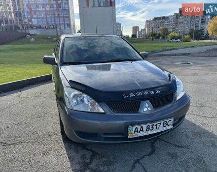 Сірий Міцубісі Lancer, об'ємом двигуна 1.58 л та пробігом 276 тис. км за 3650 $, фото 1 на Automoto.ua
