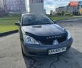 Сірий Міцубісі Lancer, об'ємом двигуна 1.58 л та пробігом 276 тис. км за 3650 $, фото 1 на Automoto.ua