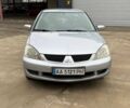 Сірий Міцубісі Lancer, об'ємом двигуна 1.6 л та пробігом 220 тис. км за 2450 $, фото 1 на Automoto.ua