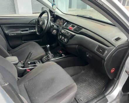 Серый Мицубиси Лансер, объемом двигателя 1.6 л и пробегом 333 тыс. км за 2800 $, фото 9 на Automoto.ua