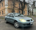 Сірий Міцубісі Lancer, об'ємом двигуна 1.6 л та пробігом 240 тис. км за 3000 $, фото 1 на Automoto.ua