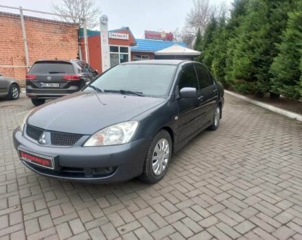 Серый Мицубиси Лансер, объемом двигателя 1.6 л и пробегом 162 тыс. км за 4650 $, фото 1 на Automoto.ua