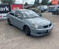 Сірий Міцубісі Lancer, об'ємом двигуна 2 л та пробігом 263 тис. км за 4300 $, фото 2 на Automoto.ua