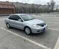 Серый Мицубиси Лансер, объемом двигателя 1.6 л и пробегом 300 тыс. км за 3000 $, фото 1 на Automoto.ua