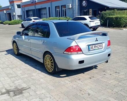 Сірий Міцубісі Lancer, об'ємом двигуна 1.58 л та пробігом 265 тис. км за 2900 $, фото 4 на Automoto.ua